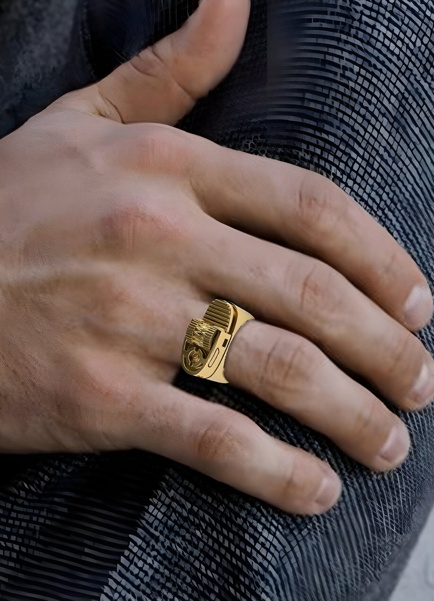 Person wearing a gold lighter ring, displayed in a front view to showcase its unique design and modern aesthetic UK.