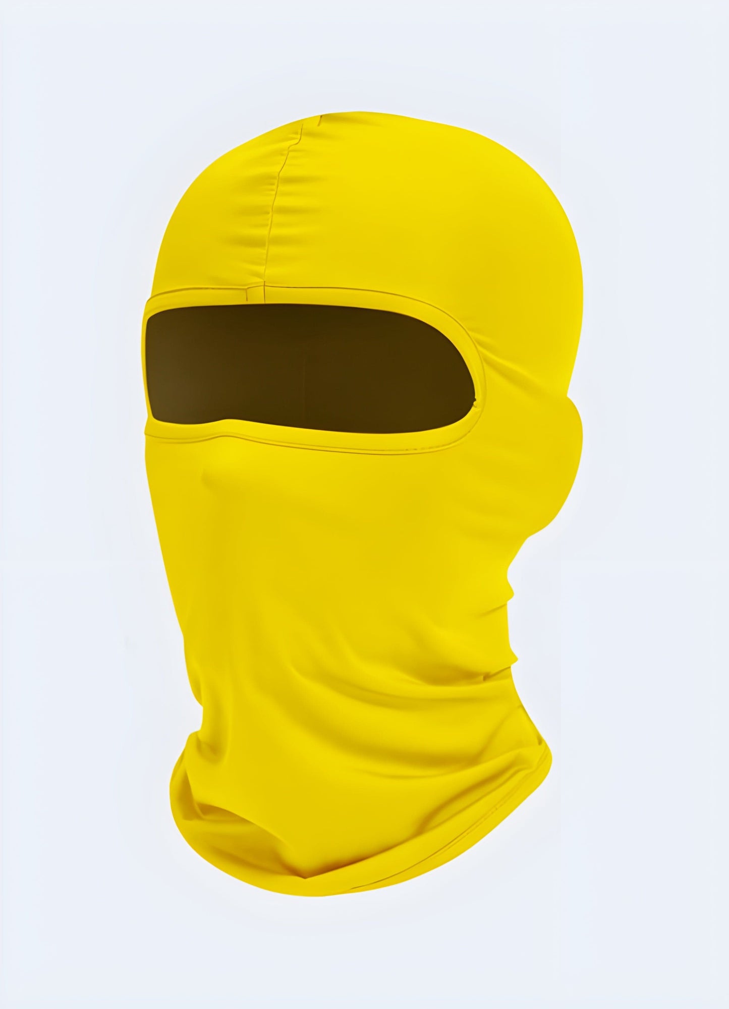 A front-side view of a yellow techwear balaclava, showcasing its stylish design and functionality, available in the UK.