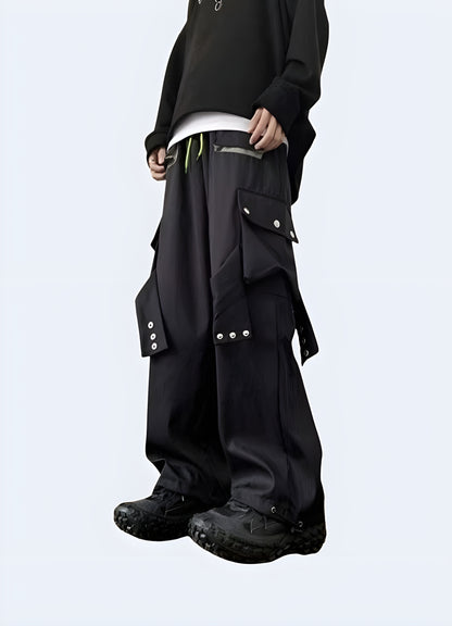 Woman modeling techwear cargo pants, showcasing the sleek design and practical features in a left side view, ideal for UK customers.