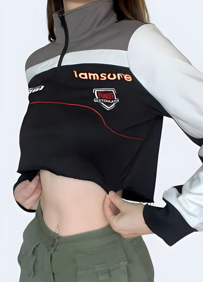 Front side view of a woman wearing a motorcycle pullover crop top, showcasing its unique style and cropped silhouette for fashion-forward women in the UK.