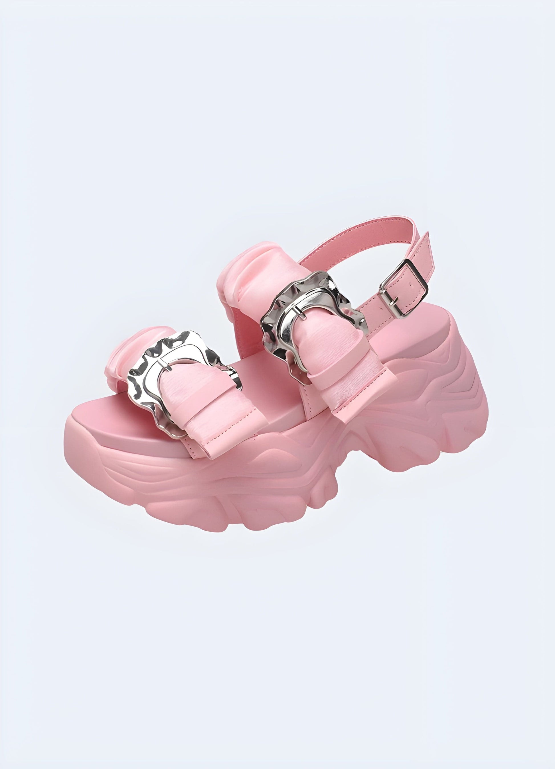 Side and front view of white chunky sandals, highlighting the platform sole and comfortable straps, ideal for fashionable UK consumers.