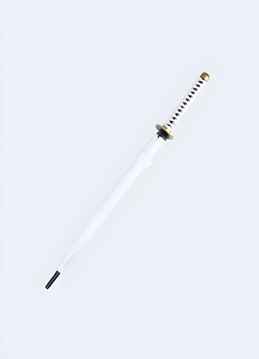 A close-up view of a white katana-style umbrella, showing its blade-like design and handle resembling a katana sword. 