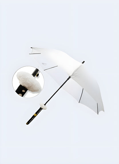 A white katana-style umbrella featuring a white fur trim. The umbrella is open, showcasing the white fur detailing that complements the white canopy.