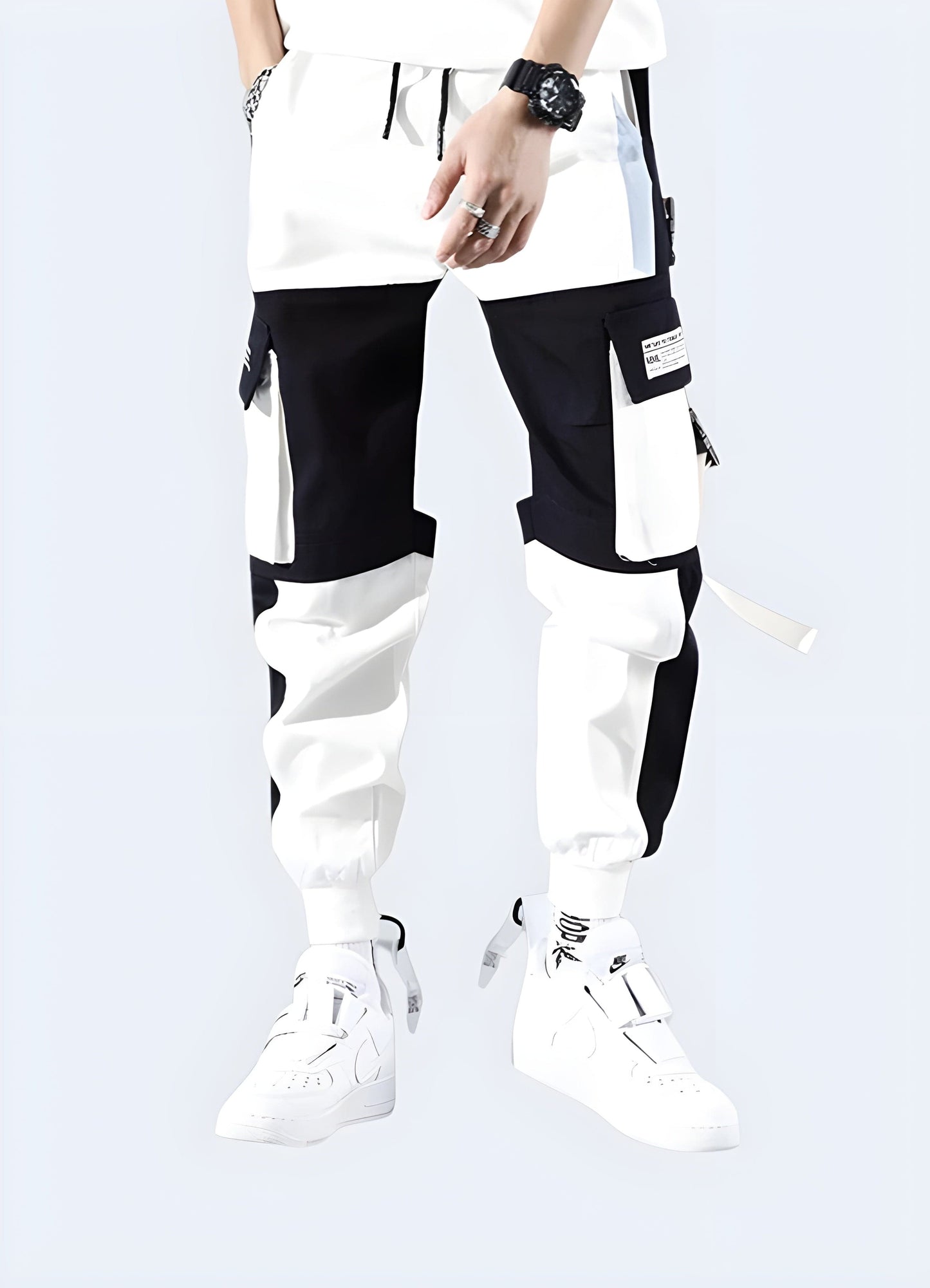 Cutting-edge white techwear pants available in the UK, featuring innovative materials and futuristic design for a sleek and modern look.