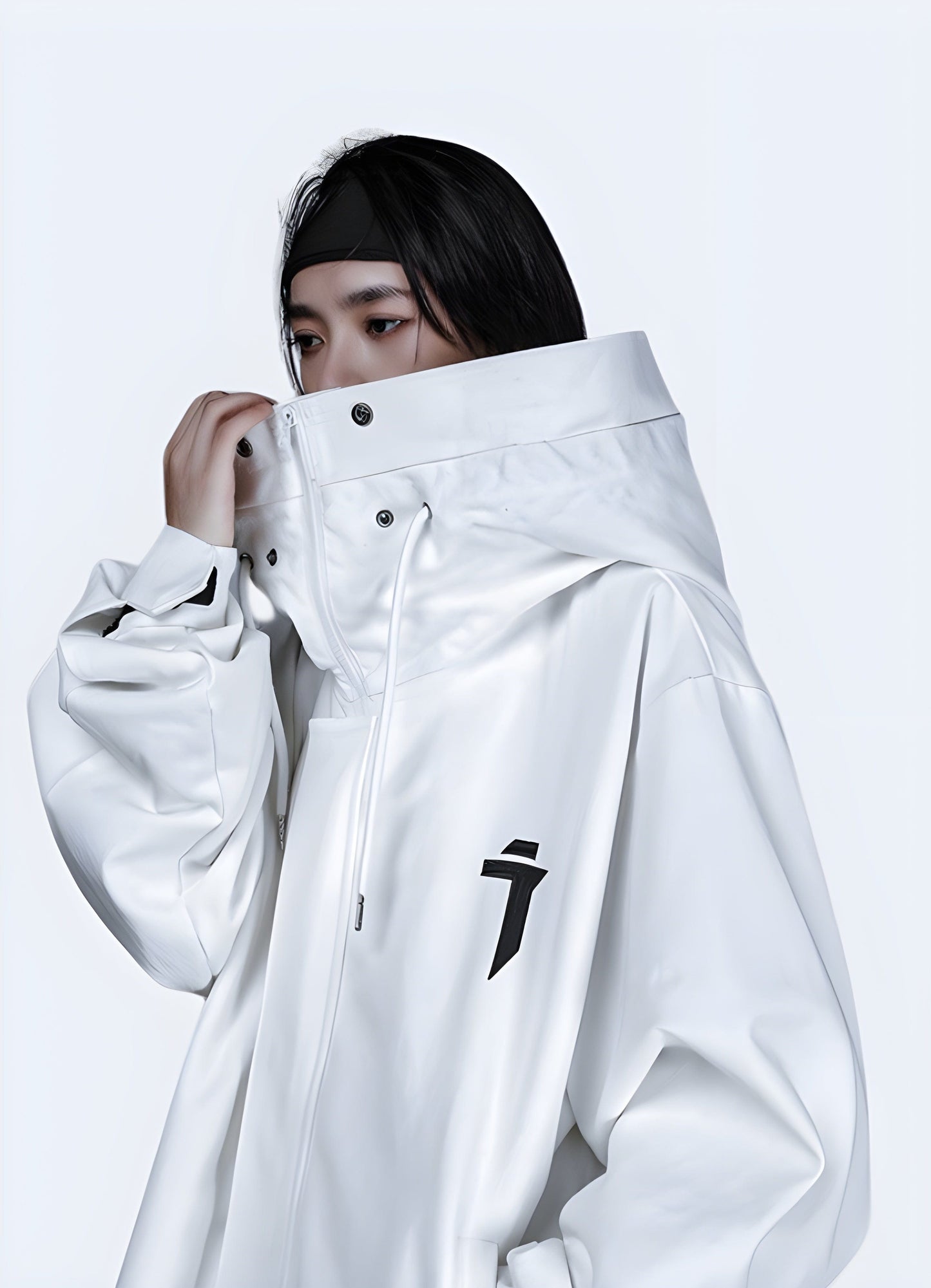 Sleek white women's techwear jacket, combining style and functionality for the modern urban woman in the UK.