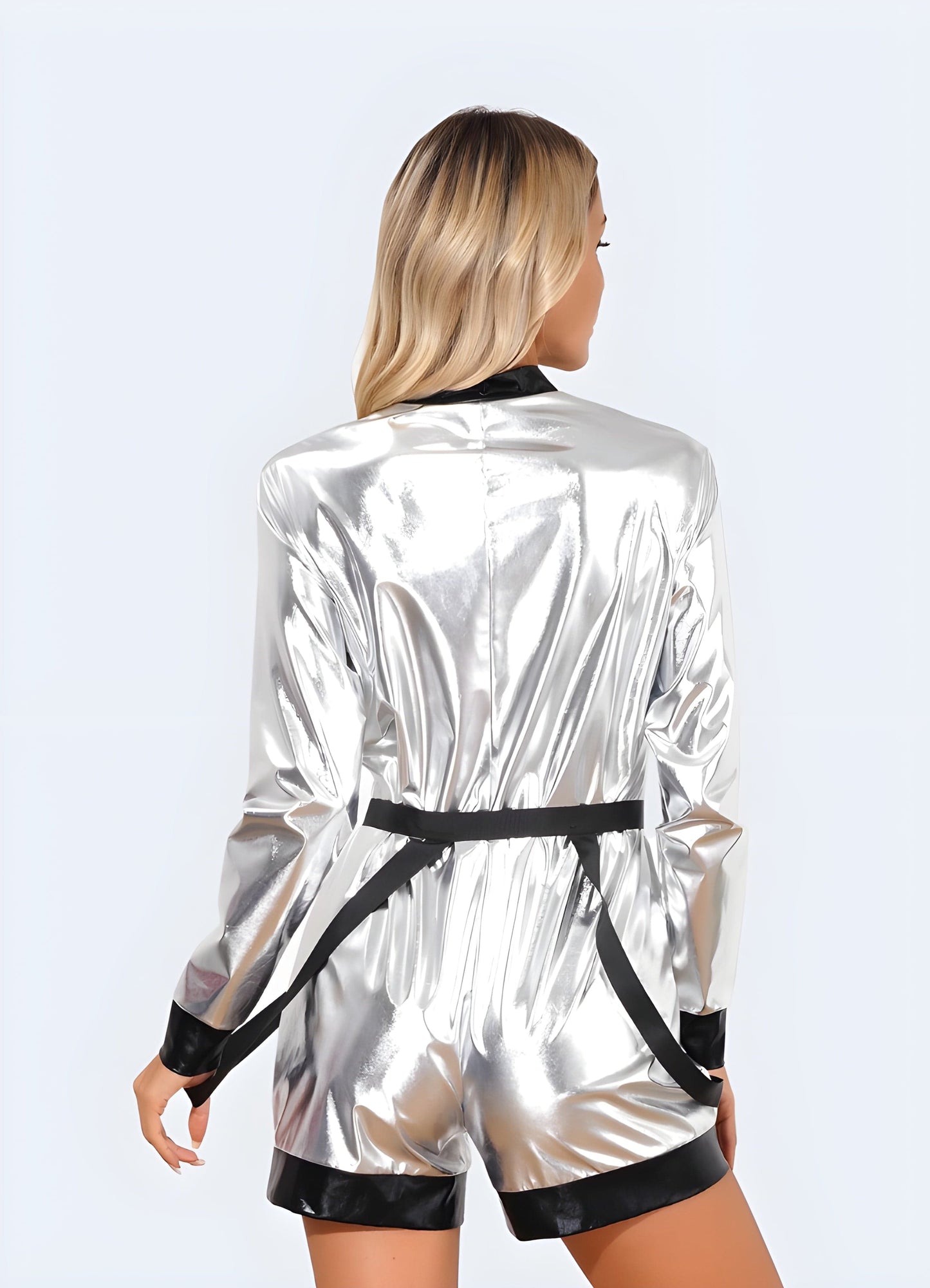 Back view of a woman in a captivating futuristic bodysuit, highlighting its distinctive features and edgy appeal for UK fashion-forward individuals.