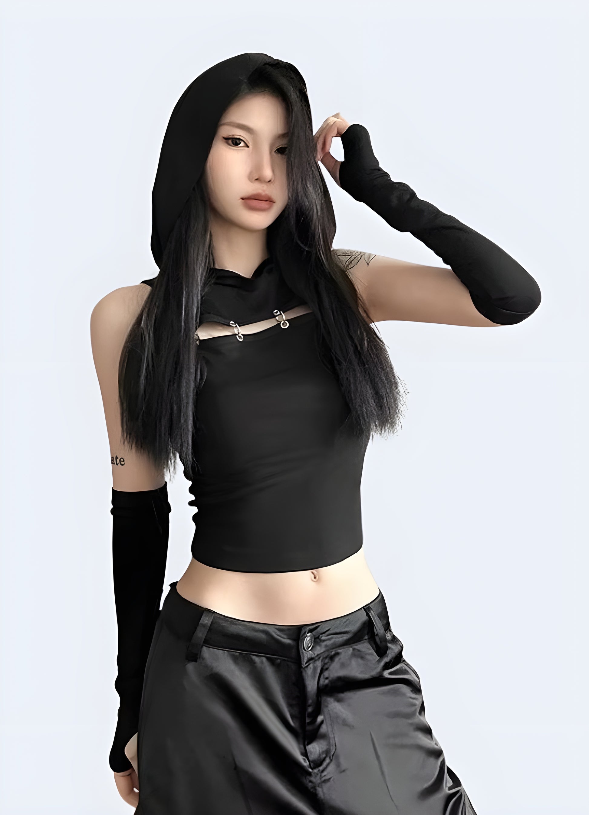 Futuristic black techwear hooded bodysuit, perfect for UK urban explorers seeking innovative and stylish apparel.