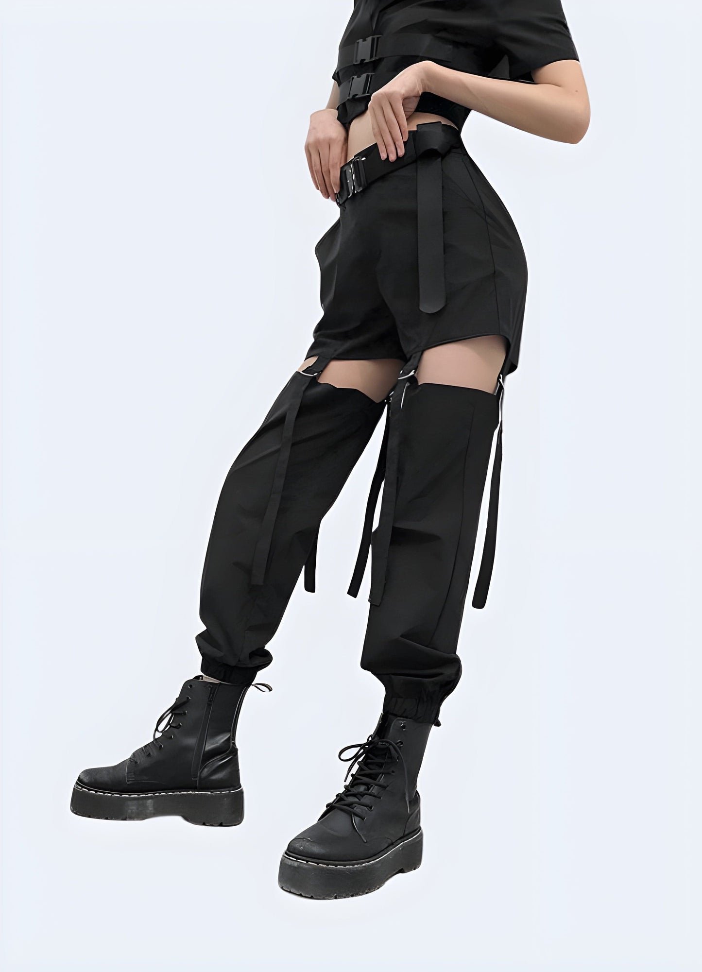 Left side view of a woman wearing adjustable cargo pants, showcasing the practical and stylish design popular among UK fashion enthusiasts.