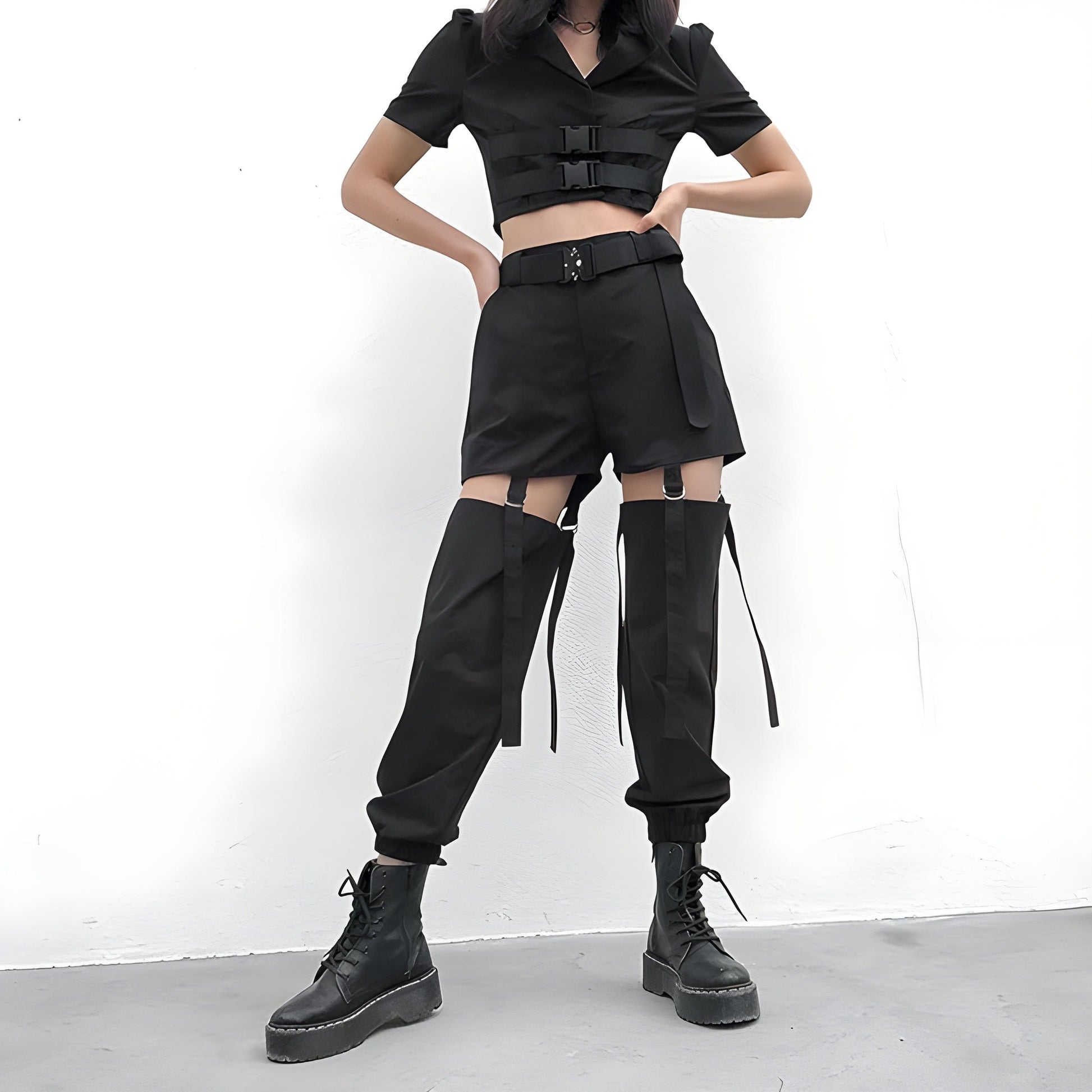 Front view of a woman wearing adjustable cargo pants, showcasing the practical and stylish design popular among UK fashion enthusiasts.