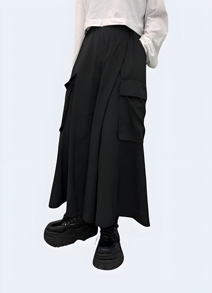 Woman modeling black hakama pants, showcasing the graceful design and flowing silhouette in a front side view, ideal for UK customers interested in traditional Japanese attire.