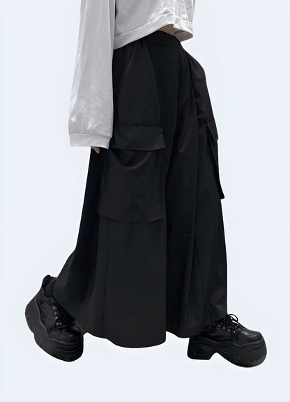 Side view of a woman wearing stylish black hakama pants, highlighting the unique pleated structure and comfortable fit, available for women in the UK.