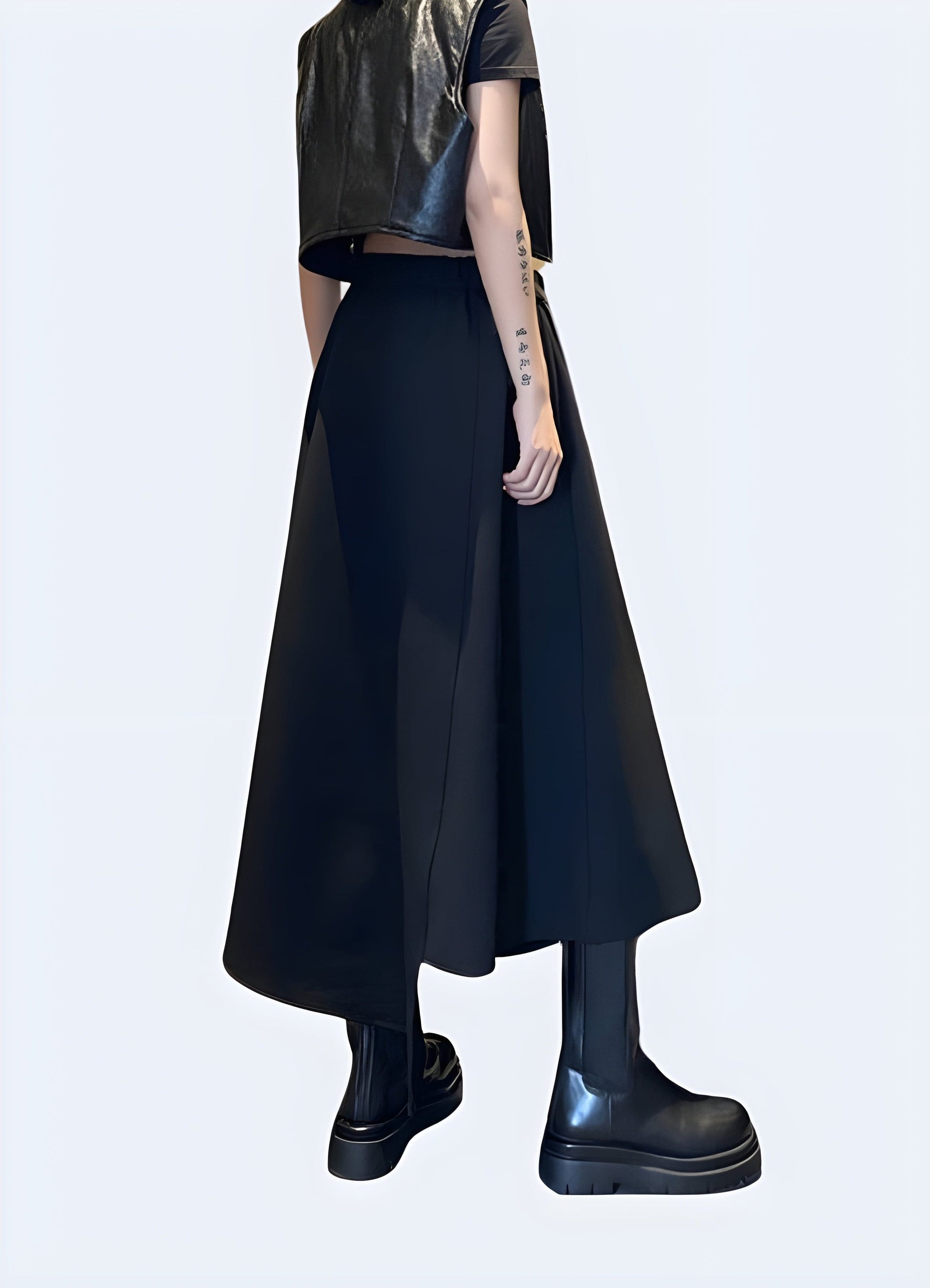 Back and side view of a woman modeling a black long techwear skirt, showcasing the fluid design, innovative materials, and futuristic aesthetics for a bold urban style statement.