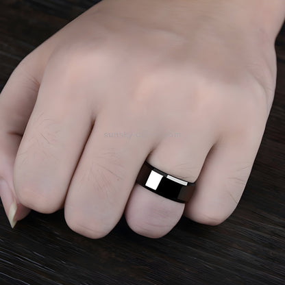 Woman wearing a black titanium ring, shown in a front view, highlighting the sleek and modern design of the ring UK.