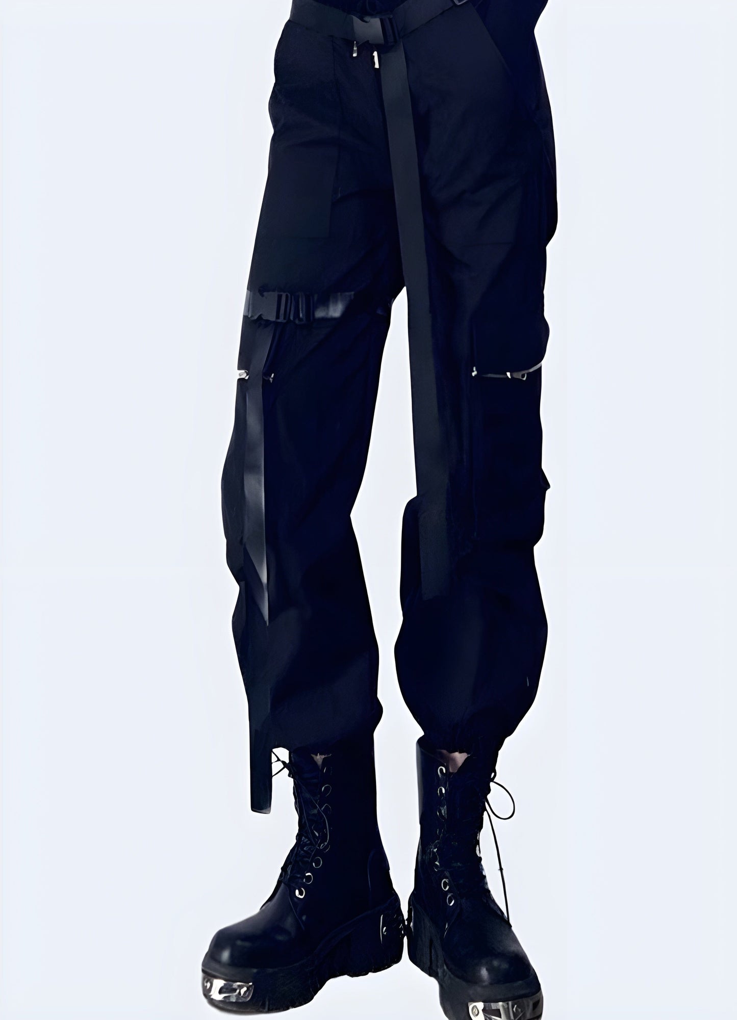  Front side view of a model wearing trendy cargo pants with techwear detailing, perfect for women seeking both utility and fashion in the UK.