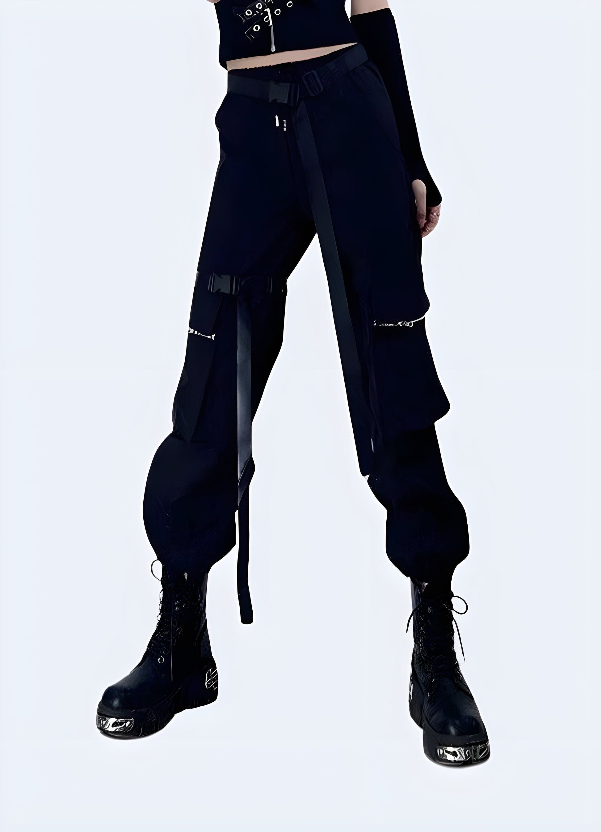 Front view of a woman wearing black cargo pants with multiple pockets, showcasing a techwear style suitable for urban exploration and everyday wear.