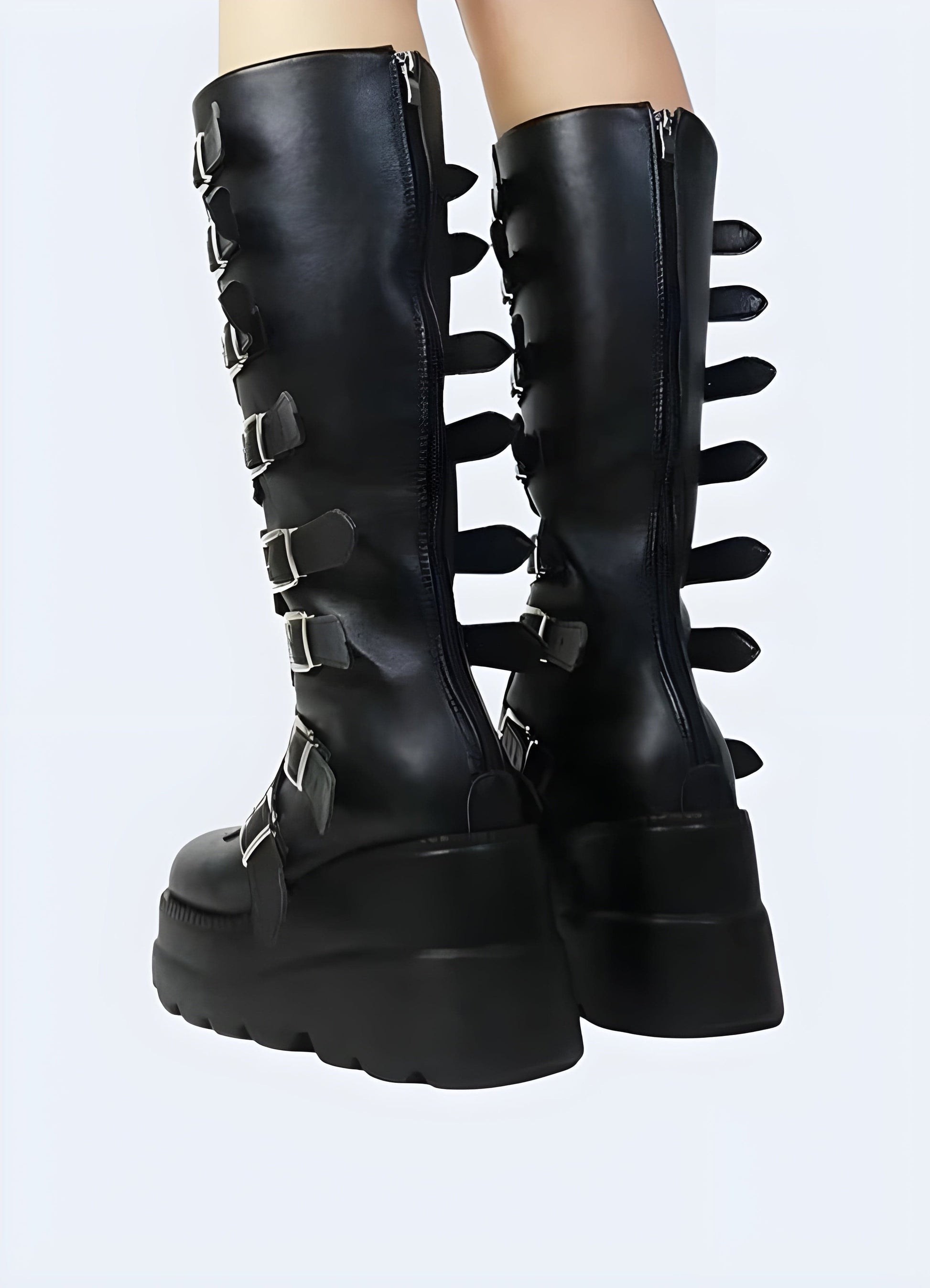 Back side view of a woman wearing goth buckle boots, highlighting their intricate buckle details and sturdy construction, ideal for UK alternative fashion enthusiasts.