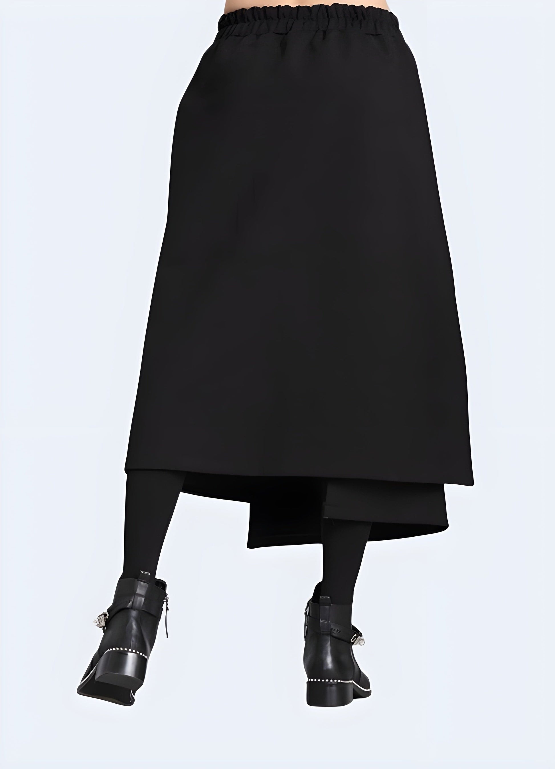 Back view of a woman modeling a ninja techwear skirt, showcasing the dark aesthetics, technical features, and streamlined silhouette inspired by ninja garments.