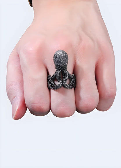 Woman wearing an octopus ring in a front view, UK, highlighting its unique and artistic design.