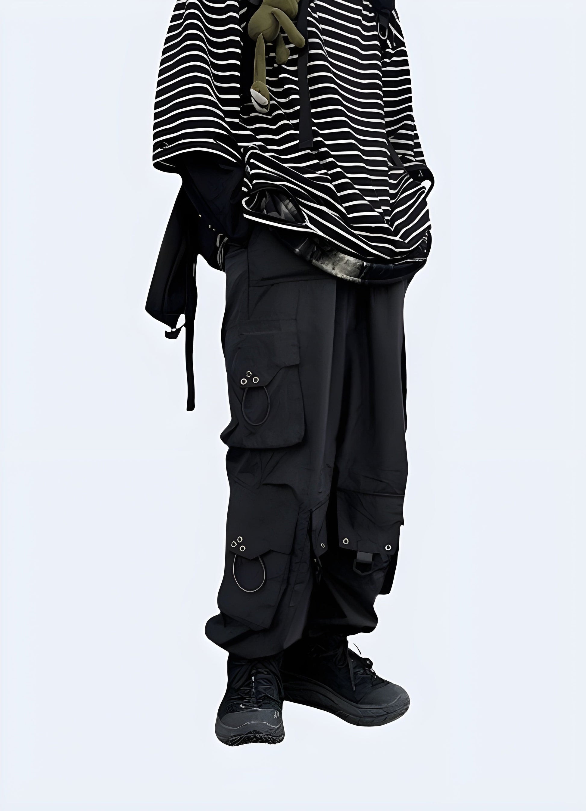 Woman wearing cutting-edge techwear cargo pants, highlighting the ergonomic fit and modern style in a right side view, available in the UK.