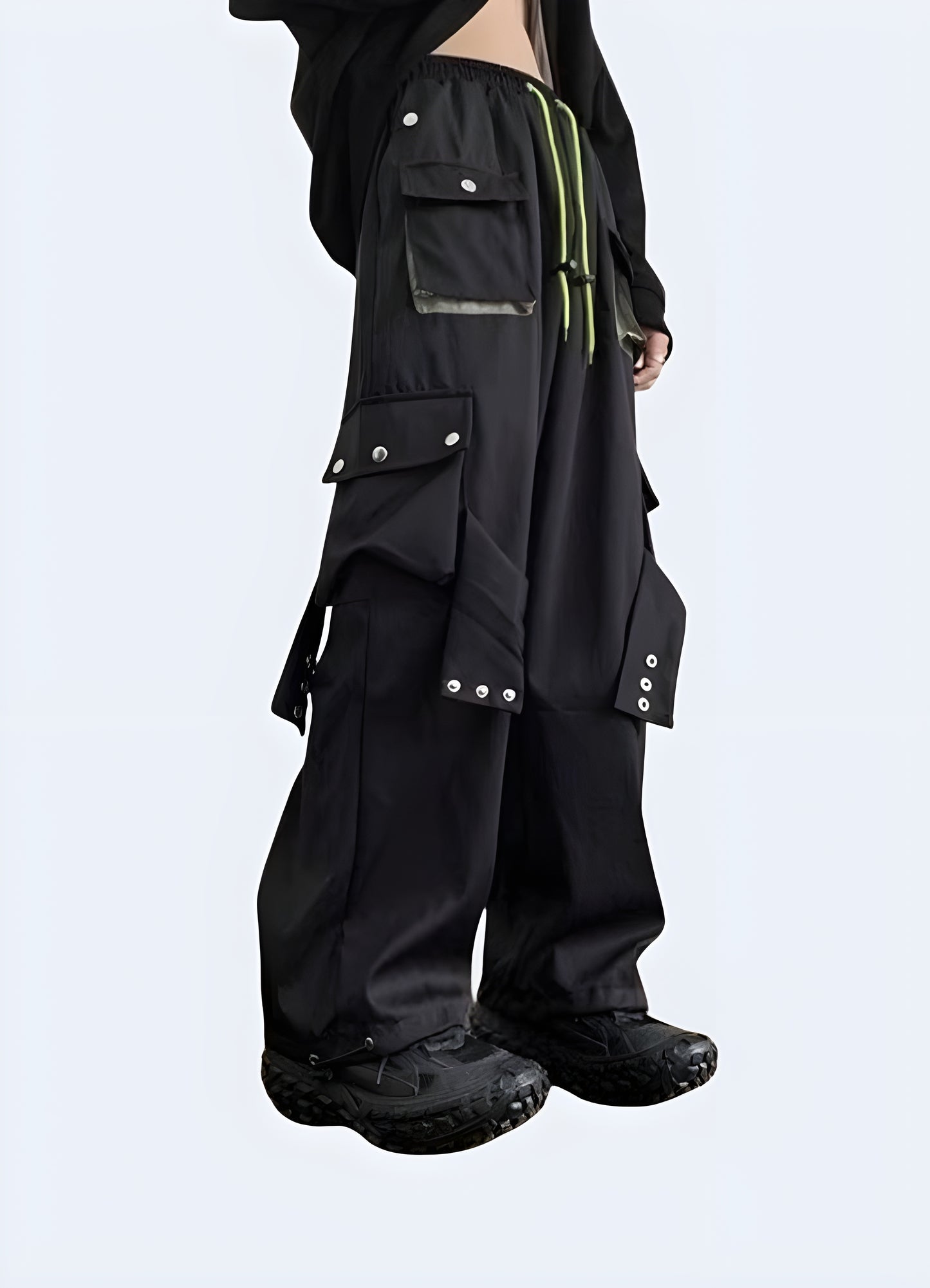 Woman wearing cutting-edge techwear cargo pants, highlighting the ergonomic fit and modern style in a right side view, available in the UK.