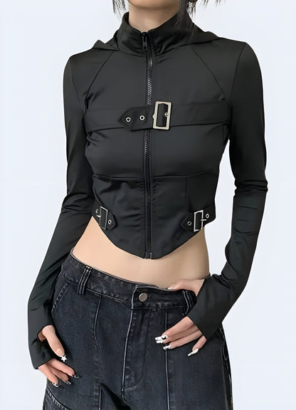 Front view of a woman wearing a techwear goth crop top, showcasing its bold design and striking visual elements for a daring fashion statement in the UK.