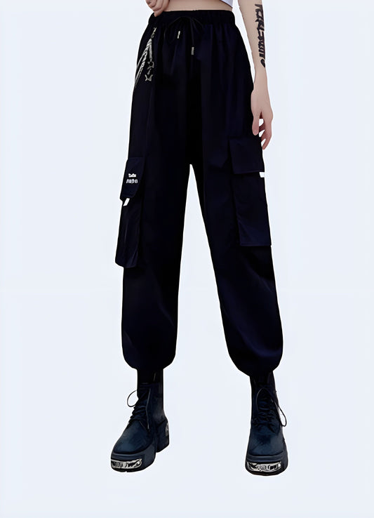 Edgy and functional techwear women's pants with chain detail, designed for urban fashion lovers in the UK.