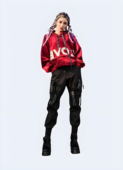 Front side view of a woman wearing techwear women's tactical cargo pants, showcasing the functional design and modern aesthetic popular in the UK.
