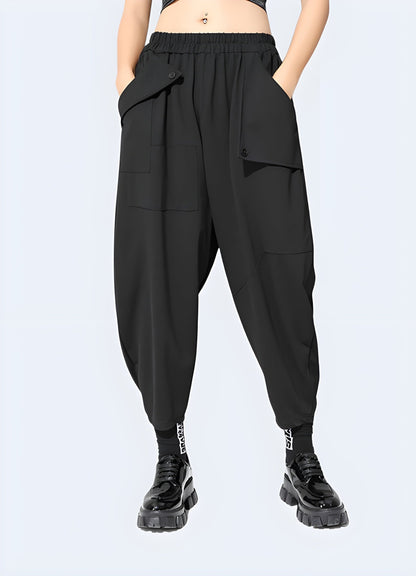 Front side view of a woman wearing women's techwear harem pants, showcasing the trendy and loose-fitting design popular among UK fashion enthusiasts.