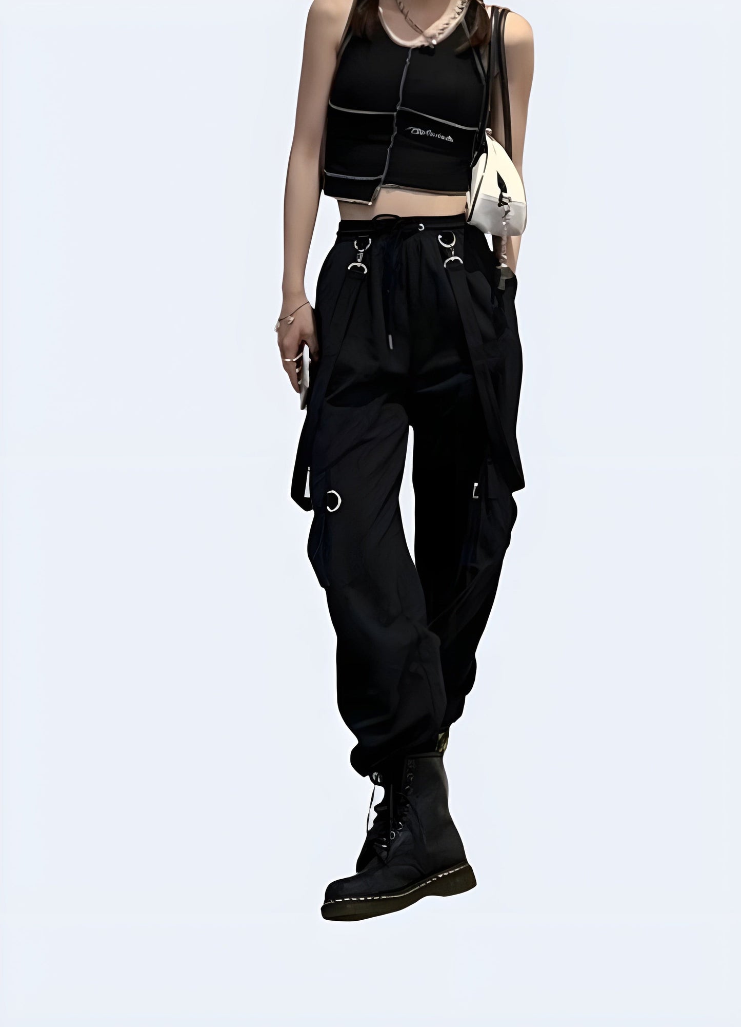 Front view of a woman wearing trendy women's cargo pants with straps, highlighting the versatile style and comfortable fit, available in the UK.