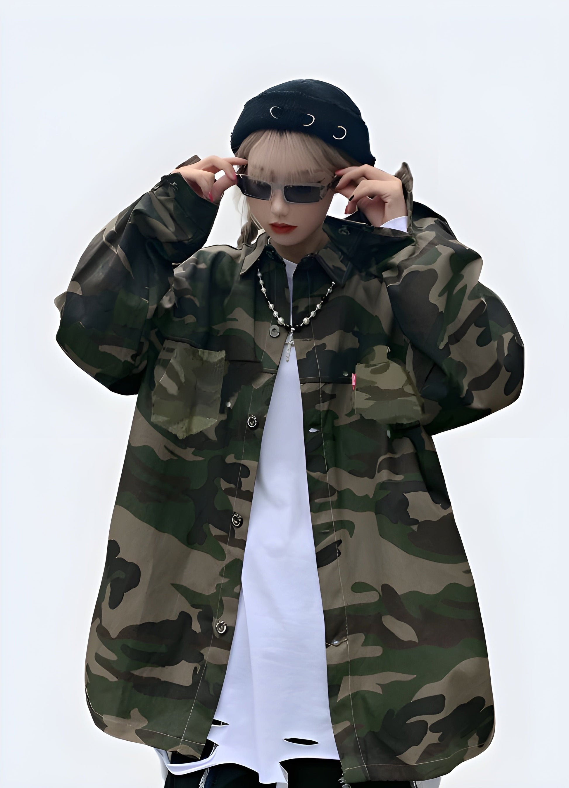 Stylish women's techwear street camo jacket, combining urban fashion with functional design for the UK streetwear scene.