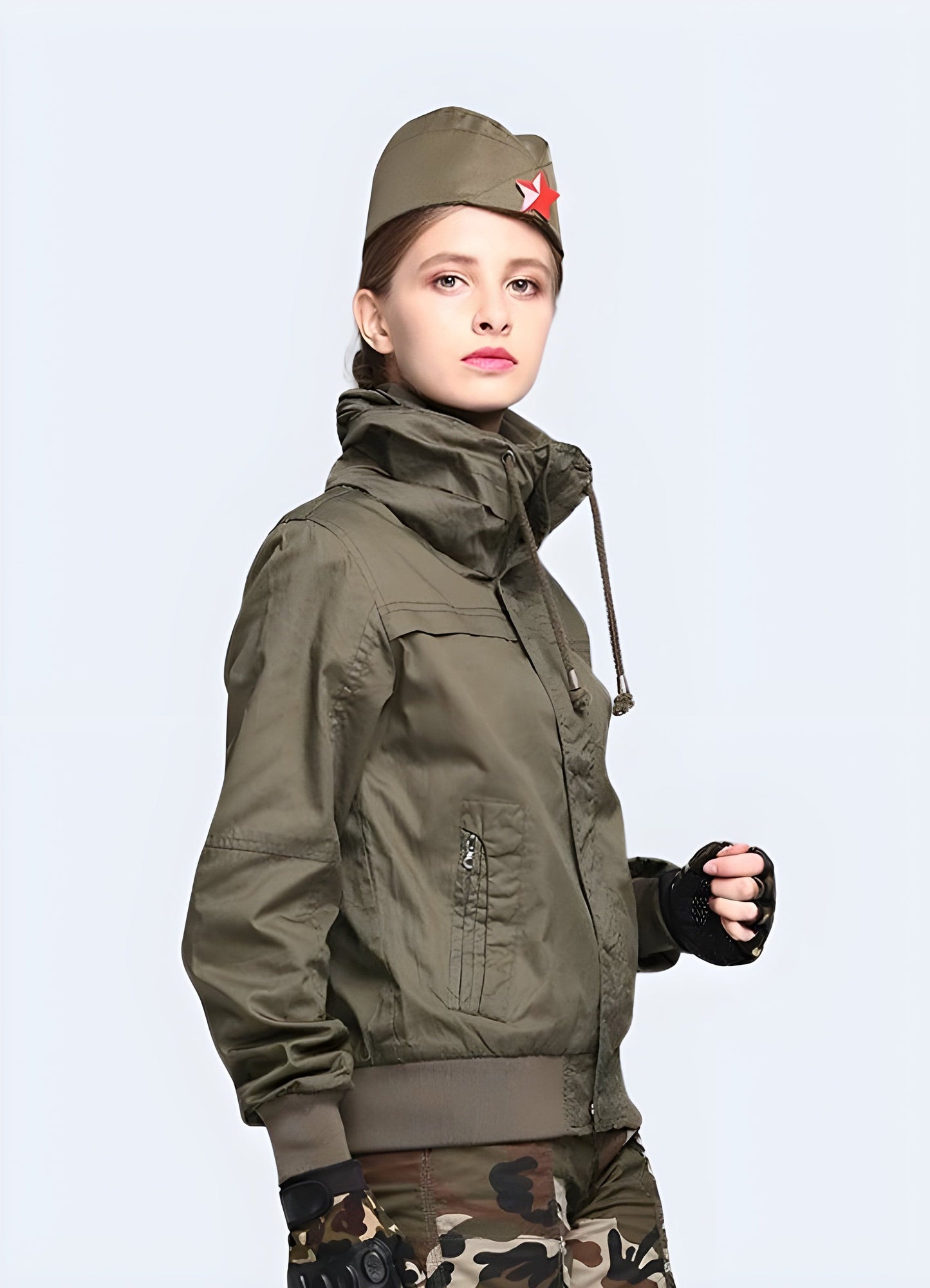 A right side view of a woman donning a durable and versatile women's tactical jacket, crafted in the UK for optimal performance and style.