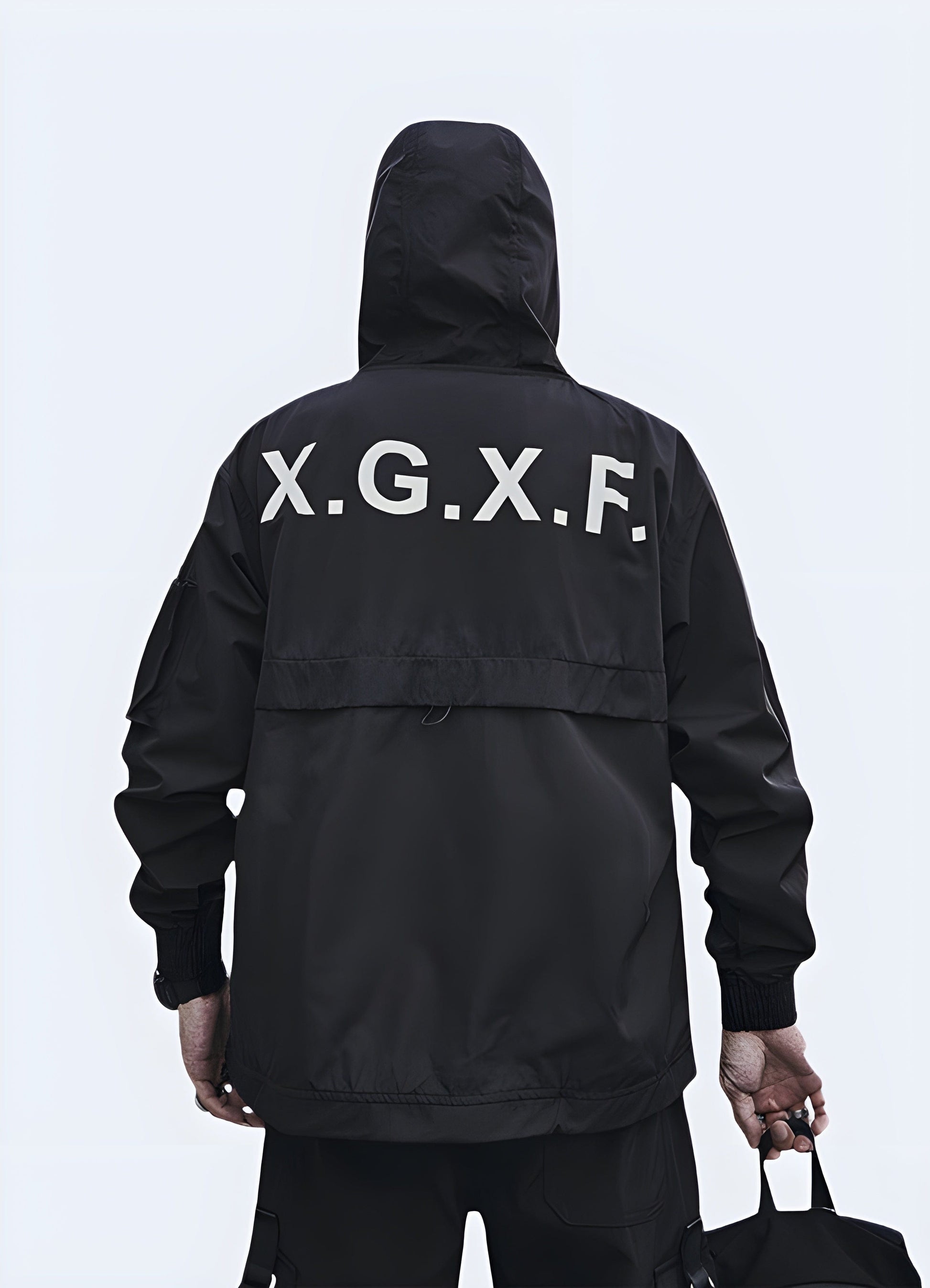 Back view of the XGXF techwear jacket, showcasing its sleek design and modern aesthetic, perfect for the UK streetwear scene.