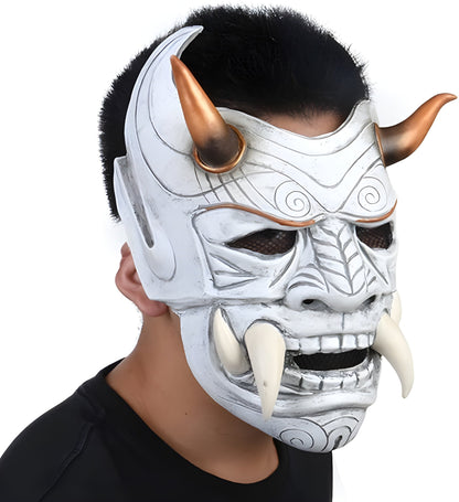 A man wearing a white Yokai techwear mask, captured side the front view, highlighting the mask's intricate design and fit on the model.