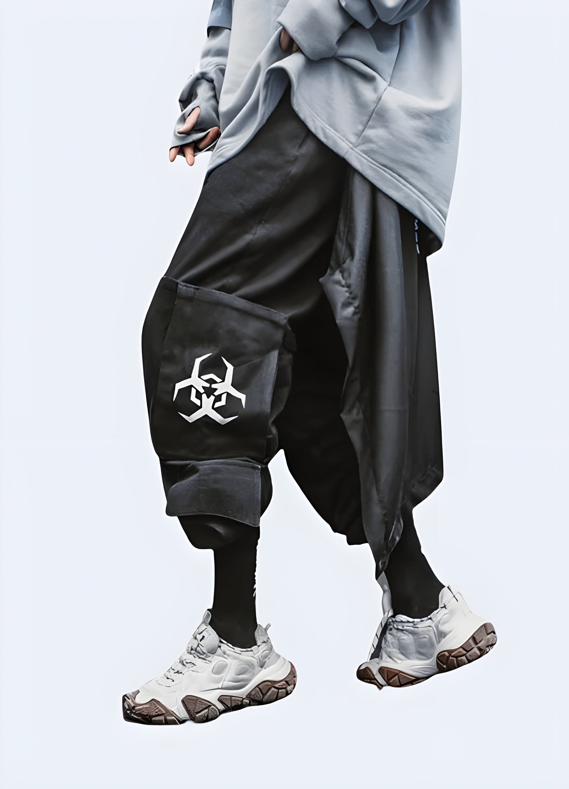 Man wearing biohazard pants in the UK, showcasing the edgy design elements from a side view, ideal for those seeking a daring look.