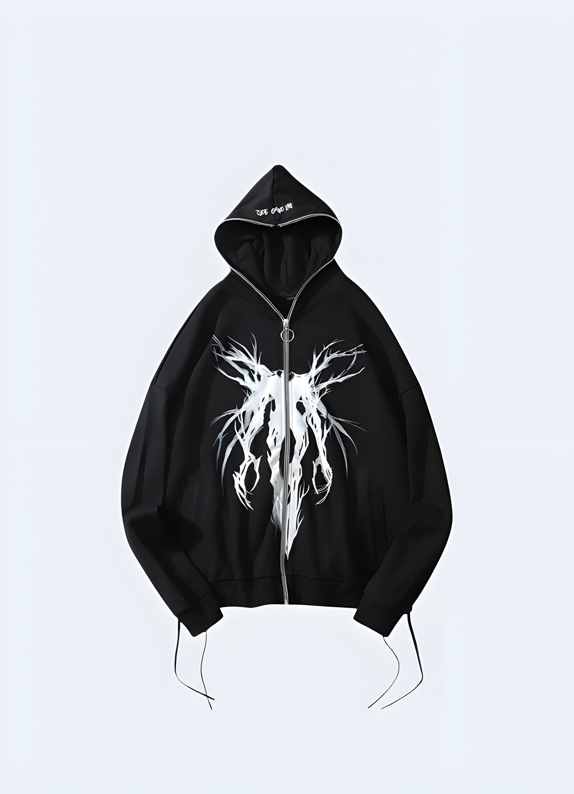 Front view of a trendy black grunge hoodie modeled in the UK, ideal for those seeking a bold fashion statement.