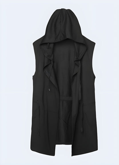 Front view of a black sleeveless jacket adorned with silver studs, adding a punk-inspired touch to men's fashion in the UK.