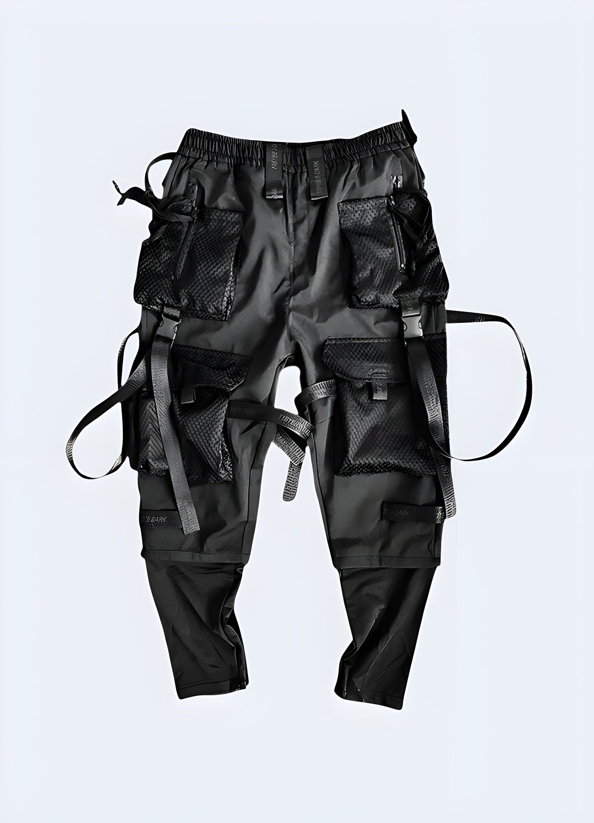 Front view of trendy black streetwear pants, highlighting the contemporary style and versatile design, a must-have for fashion-forward individuals in the UK.