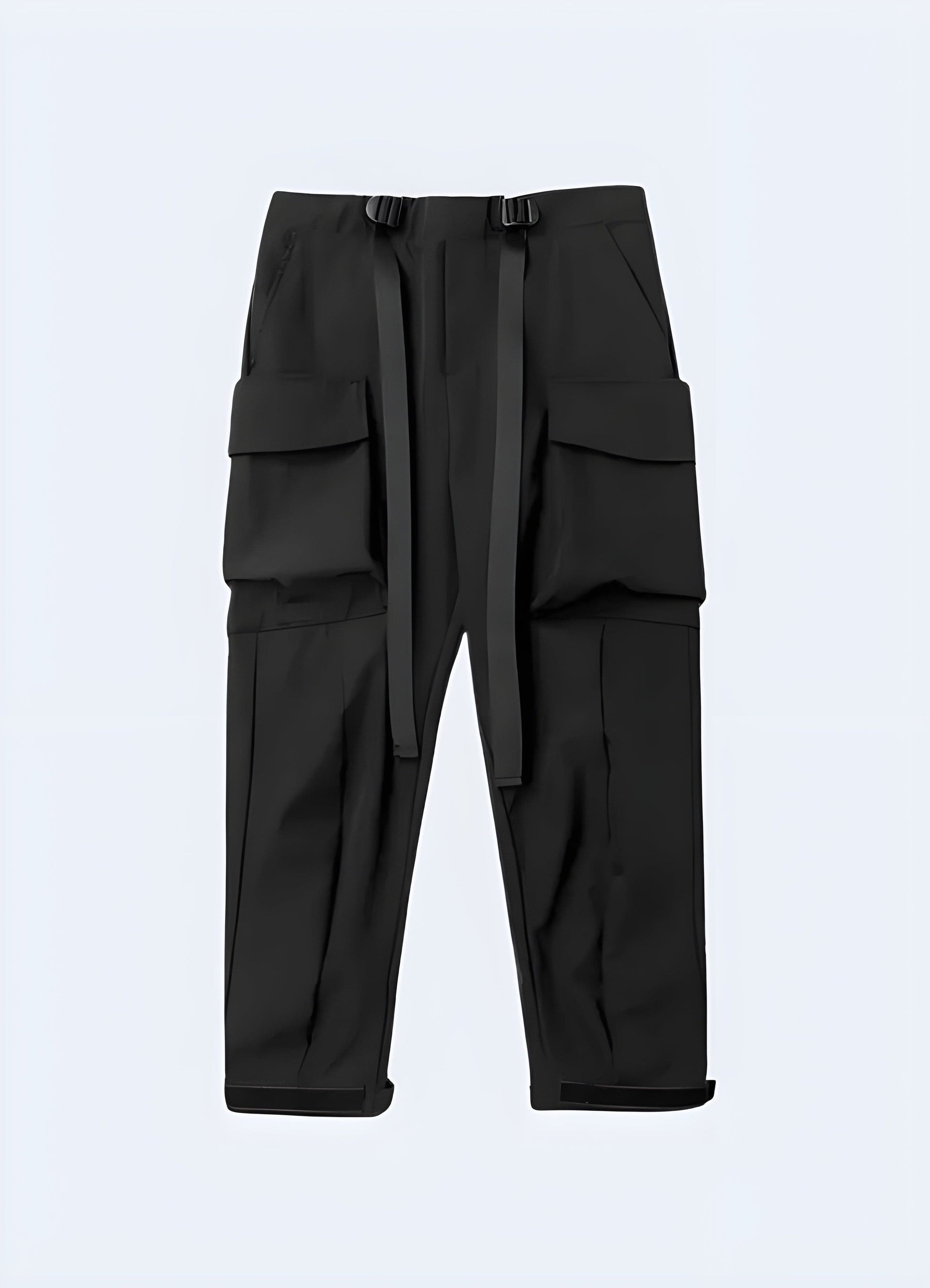 Male model showcasing the front view of black tactical pants, highlighting the sleek design and functional pockets, perfect for the UK fashion-conscious adventurer.