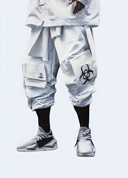 Front view of a man wearing white pants with biohazard symbol print in the UK, highlighting the striking contrast and eye-catching style.