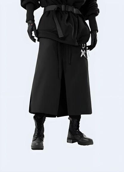 Front view of a man wearing black ninja pants in the UK, highlighting the iconic look and versatile style suitable for both martial arts training and everyday wear.