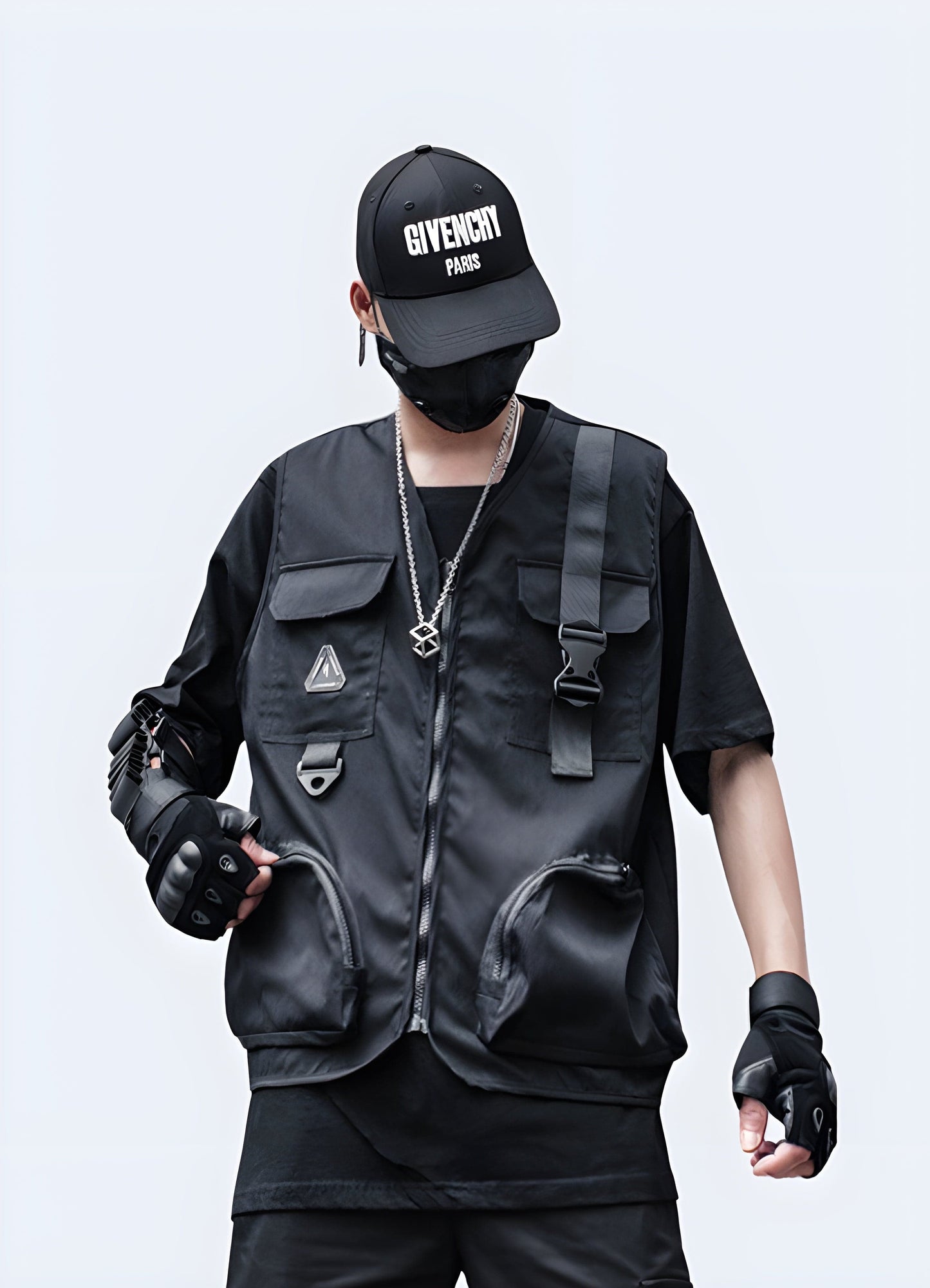 Man wearing a black cargo vest with multiple pockets and adjustable straps, showcasing a trendy streetwear look from the front view.