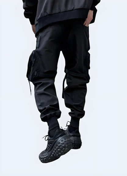 Back view of a man wearing genuine paratrooper pants, showcasing the garment's iconic silhouette and practical pocket placement, perfect for fashion enthusiasts in the UK looking for a bold, military-inspired statement piece.