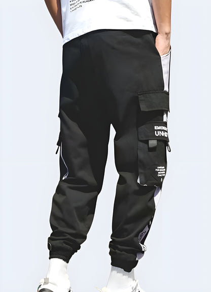 Back view of a man wearing innovative purple techwear pants, showcasing the garment's sleek silhouette and unique color, perfect for fashion-forward tech enthusiasts in the UK looking to make a statement.