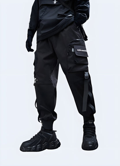 Left view of a man wearing innovative tactical techwear cargo trousers, emphasizing the premium materials and practical features, ideal for urban explorers and outdoor enthusiasts in the UK.