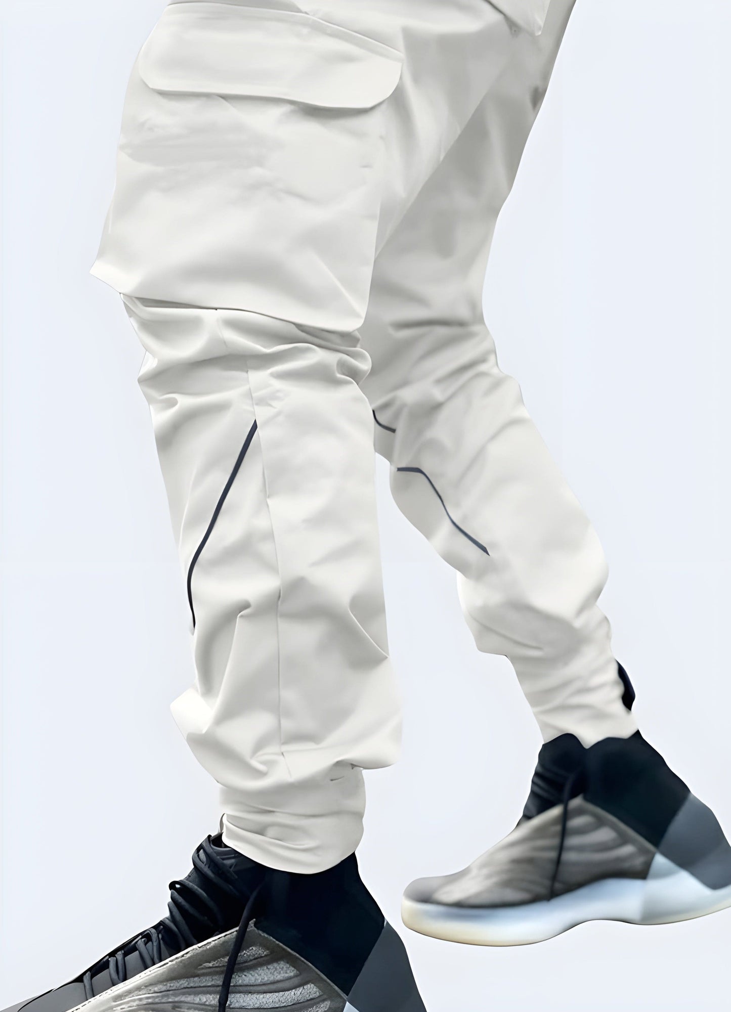 Front side view of white reflective pants available in the UK, highlighting the modern design and reflective elements that combine fashion and functionality.