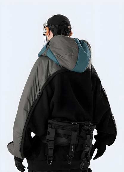 Rear view of a man wearing a fashionable Japanese streetwear hoodie, showcasing its unique design details, available in the UK.