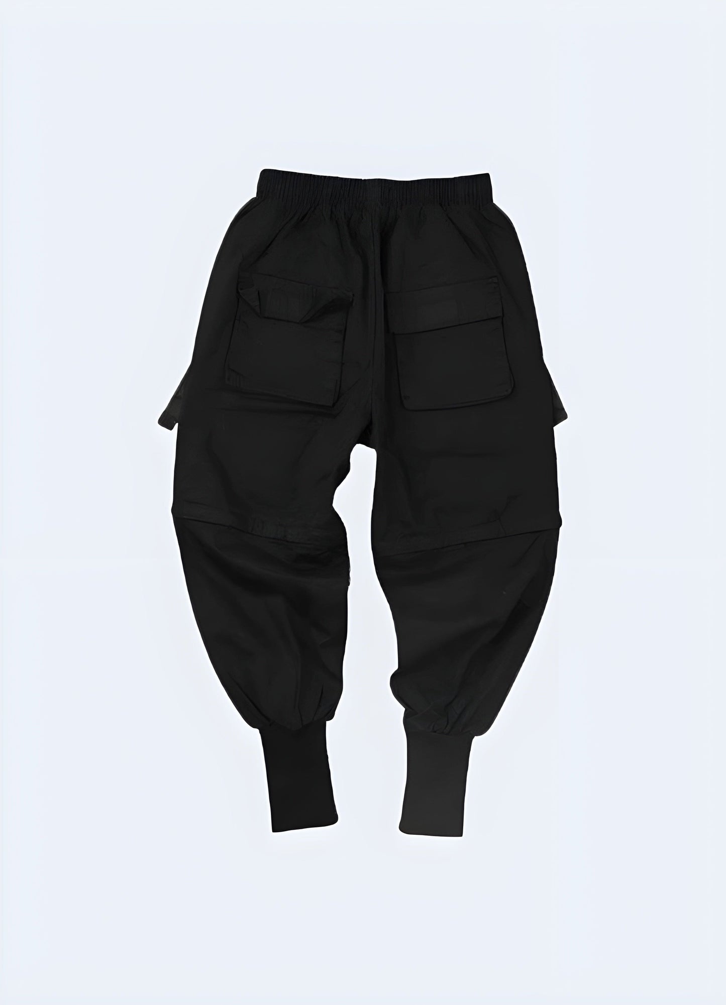 Back view of a model sporting innovative techwear sweatpants, highlighting the premium materials and streamlined design, a must-have for UK consumers seeking both comfort and modern style.