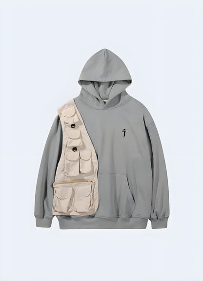 Front view of a multi-pocket hoodie featuring numerous compartments and zippers, providing ample storage space and easy access to essentials for those on the go or engaging in outdoor activities.