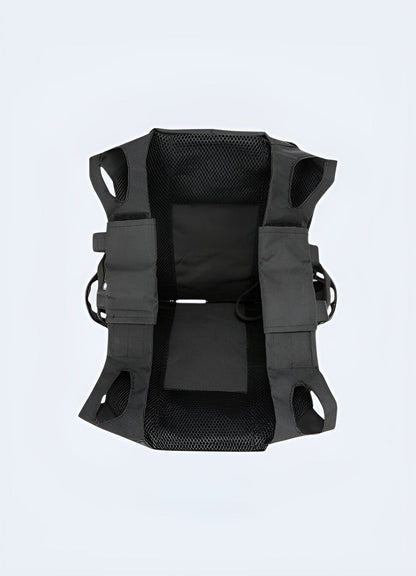 Open view of Scarlxrd's black military-inspired tactical vest, showcasing the interior lining and multiple storage compartments for practicality and style.