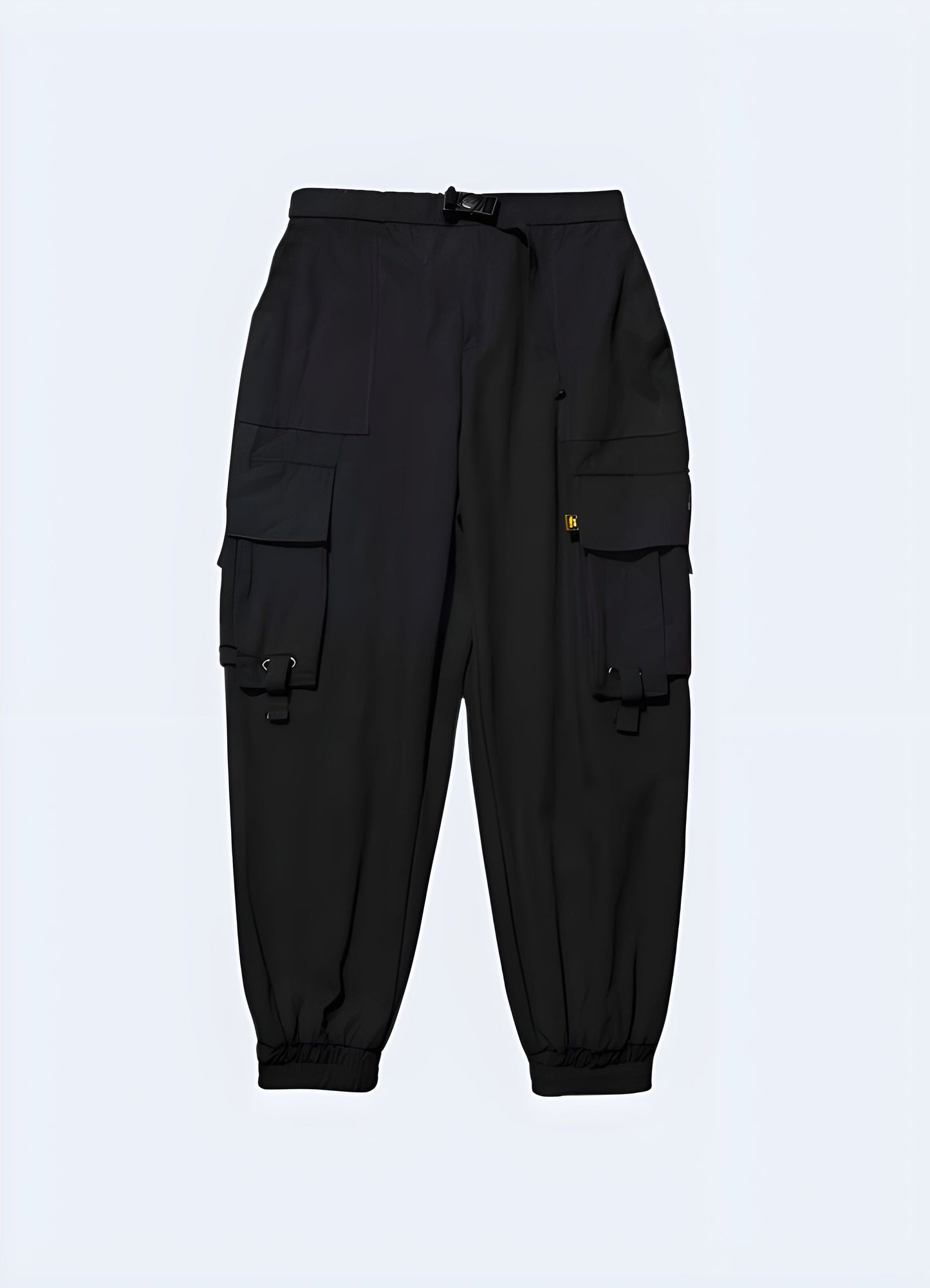 Front view of stealth tactical ninja pants with numerous pockets, available in the UK, highlighting the functional design and modern aesthetics that cater to those seeking both utility and fashion.